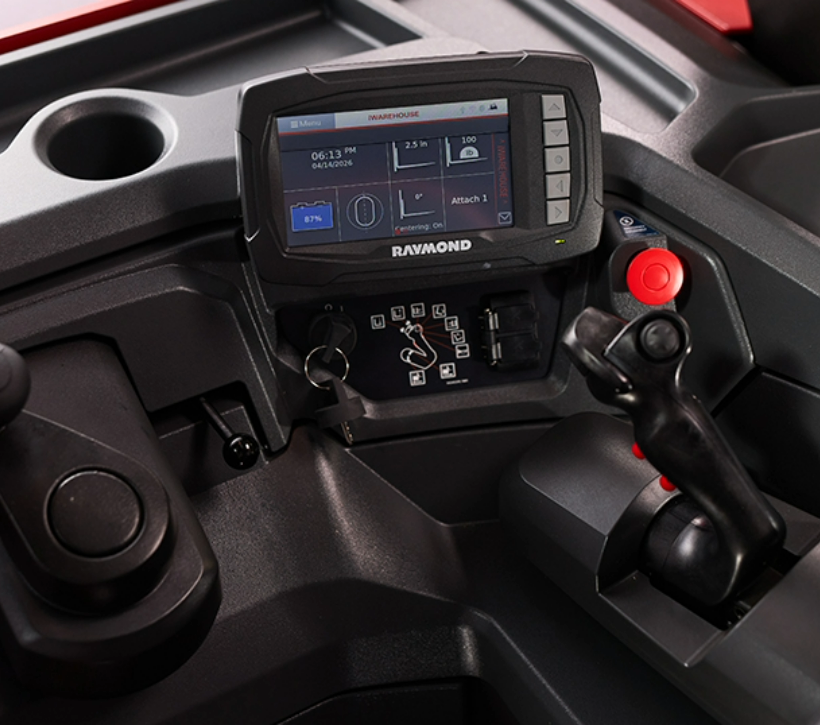 Close-up of Raymond stand-up counterbalanced forklift control panel with full-color 7-inch touchscreen display and joystick controls